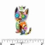 Cat pin next to ruler showing approximately 0.65 in width and 1.5 in height