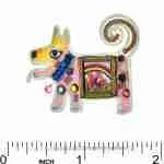 Dog pin with rainbow and flowers next to ruler showing approximately 1.4 in width