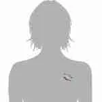 Pisces twin fish pin shown on gray bust form at chest level