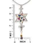 Star of David necklace pendant next to ruler showing approximately 2 in high by 0.9 in wide