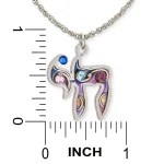 Blue and purple Chai necklace pendant next to ruler showing approximately 0.85 in high by 0.7 in wide